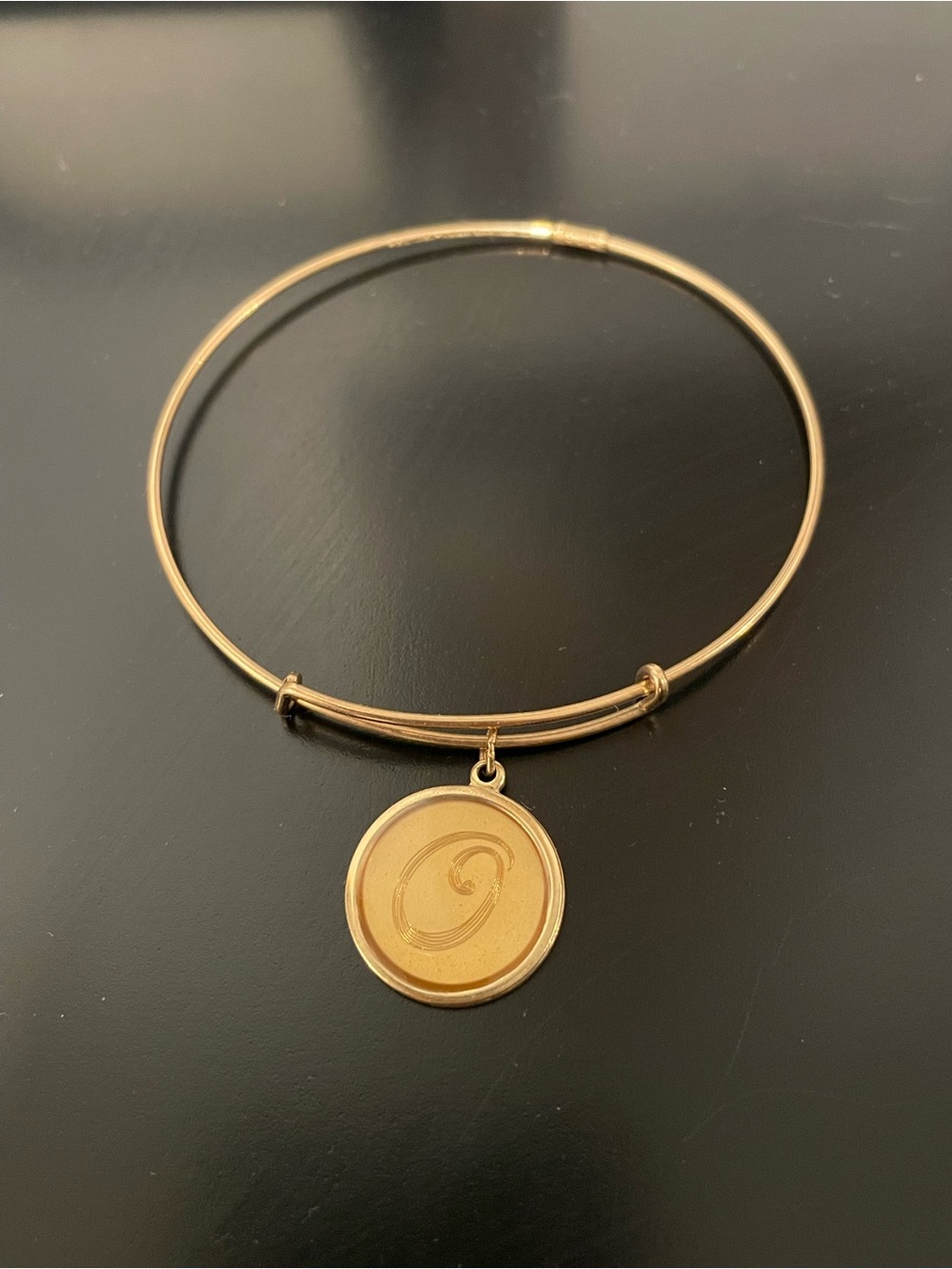 Alex and Ani gold plated bracelet with a letter O